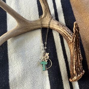 Turquoise and silver cross necklace